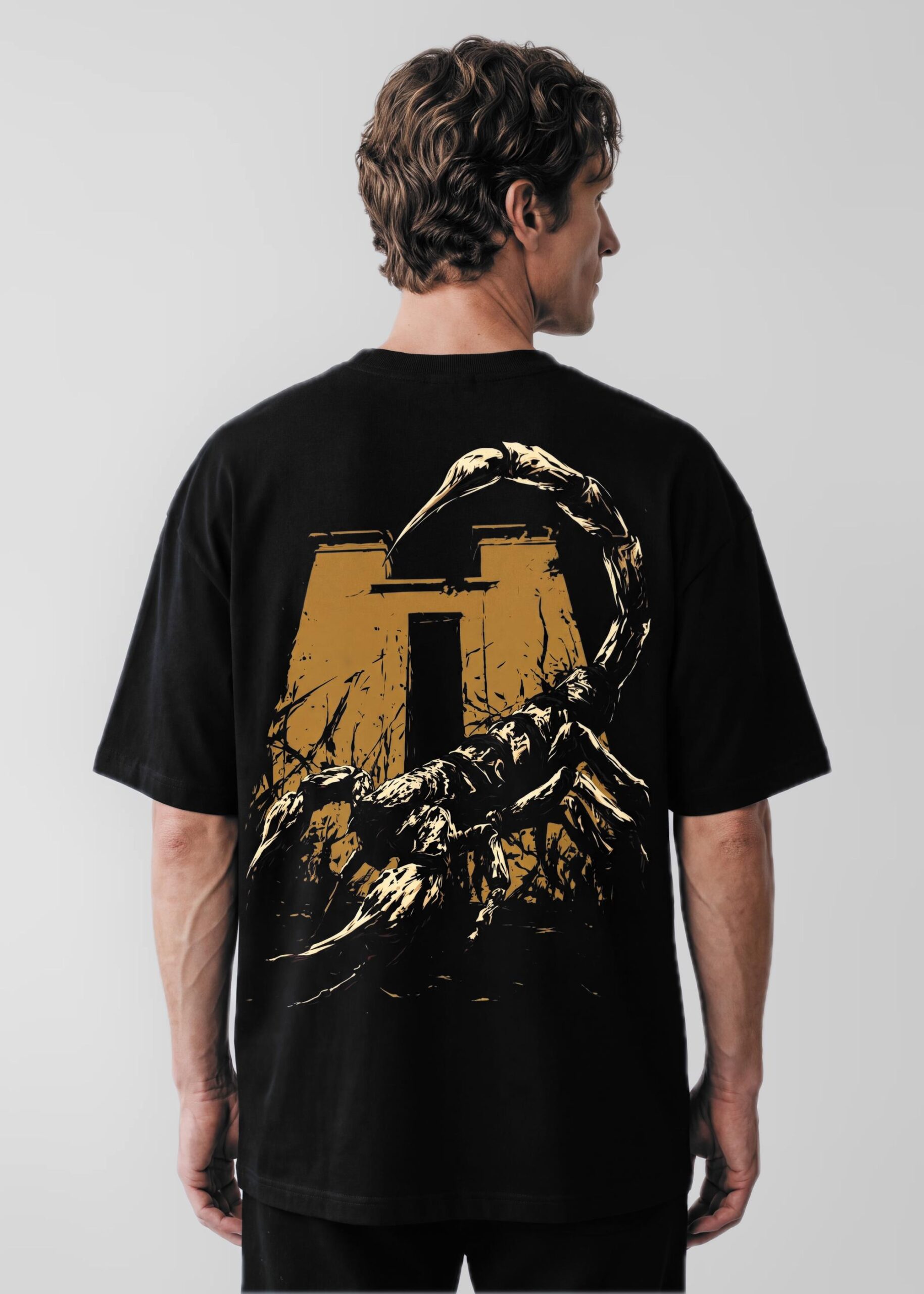Guardian of Venom (Serqet), Egyptian mythology oversized black t-shirt by Neolithic Store — model wearing the back print